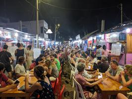 Every night, they close down this street and a ton of little restaurants take it over.