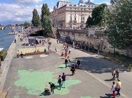 People practicing Parkour. There are several places along The Seine where you can train, and as far as I could tell, they are all free.