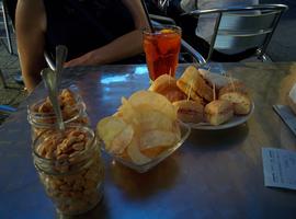 Many bars have "aperitivos" which basically means that if you order a drink, you get a bunch of snacks to go with it. Unfortunately, we were completely full after our cooking class.