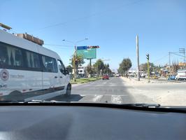 Taking a taxi to the hostel. Peruvian stoplights often have timers.