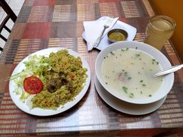 Chicken and rice with caldo blanco.