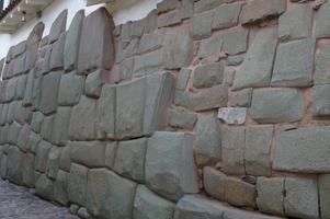 Inca wall on the left, Spanish wall on the right.