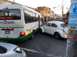 After this VW Beetle hit a colectivo, the colectivo operator got out and yelled at the driver, probably tried to get some money out of him, then just drove off.